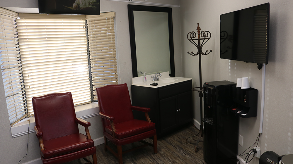 Sink and private area inside the Fort Worth barber suite